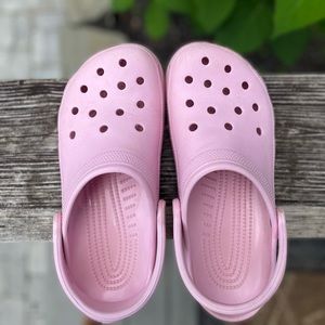 Crocs light pink. Mens 7 Woman 9